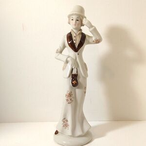 Elegant White and Brown Porcelain Female Figurine